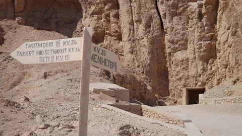 Guided Pathways: Sign to Thutmosis III and Menhetep II Tombs - 4K Stock Footage 255726527