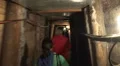 Guided tour expedition mountain salt mine tunnel HD Footage