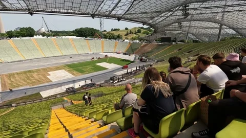 Guided tour through the Olympic  stadium  in Munich Stock Footage 238773139