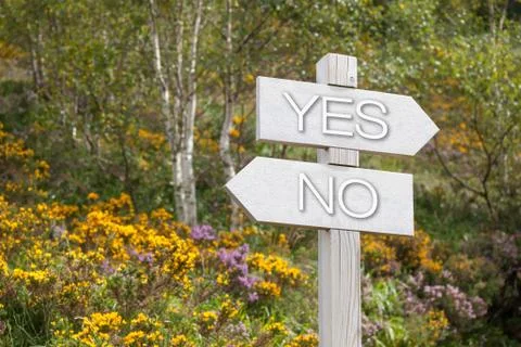 Guidepost in mountains, yes, no Stock Photos