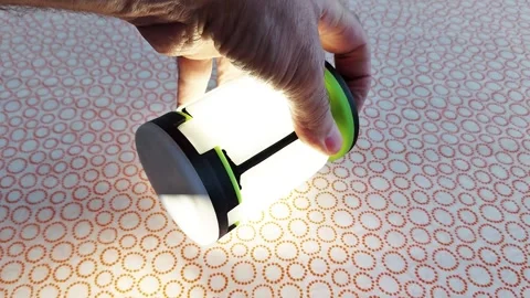 Guiding Light: Hand Holding Flashlight Lamp Stock Footage 311500635