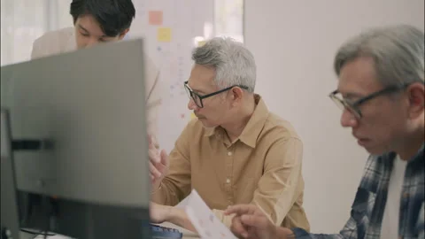 Guiding Senior Team Collaboration In Technology Project Development. Stock Footage 308165672