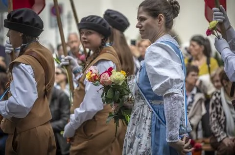 Guild Members and Spectators Exchanging Flowers During Sechseluten Spring P.. Photos
