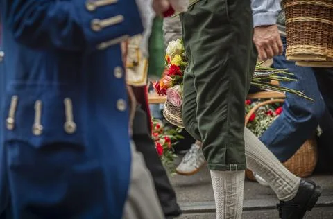 Guild Members and Spectators Exchanging Flowers During Sechseluten Spring P.. Stock Photos