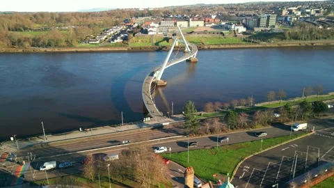 Guildhall and Peace Bridge Derry-Londonderry Aerial Flyover Stock Footage 299972187