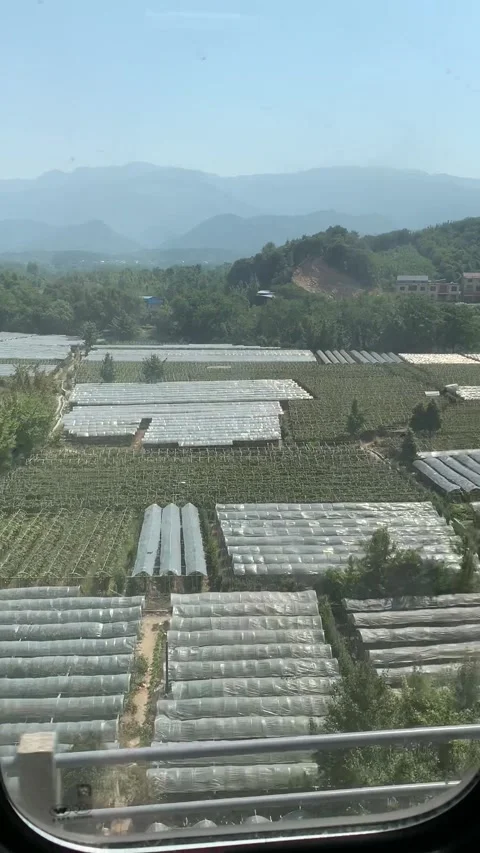 Guilin, China - 2019/09/22 : Fields view from a train Stock Footage 341276441