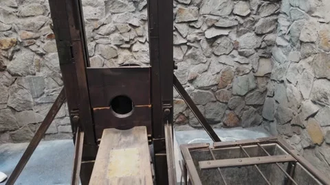 Guillotine in a stone room, at War Remnants Museum, Ho Chi Minh City, Vietnam Stock Footage 334896815