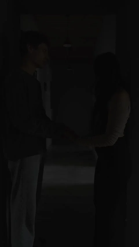 Guilt ridden boyfriend apologizing after argument holding girlfriend hands in 스톡 동영상 321089666
