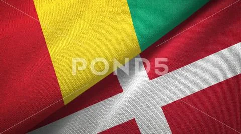 Guinea and Denmark two flags textile cloth, fabric texture Stock Photos