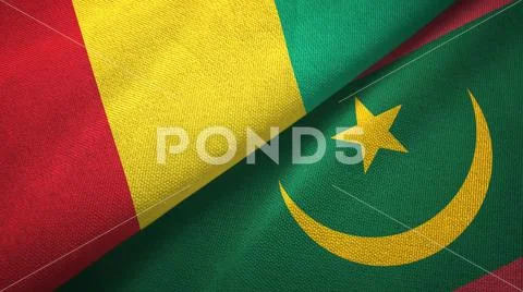 Guinea and Mauritania two flags textile cloth, fabric texture Stock Photos