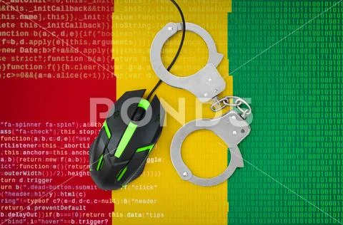 Guinea flag and handcuffed computer mouse. Combating computer crime, hackers Stock Photos