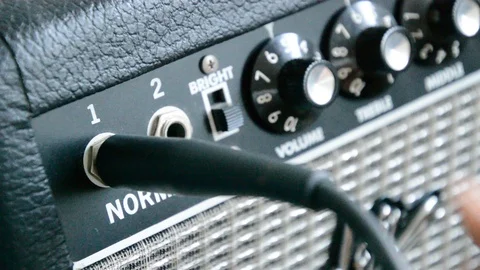 Guitar Amp 1080p - Closeup Angle - Plug In and Volume Boost Video stock 104834948