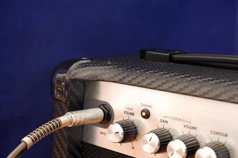 Guitar amplifier and control knobs close up Stock Photos