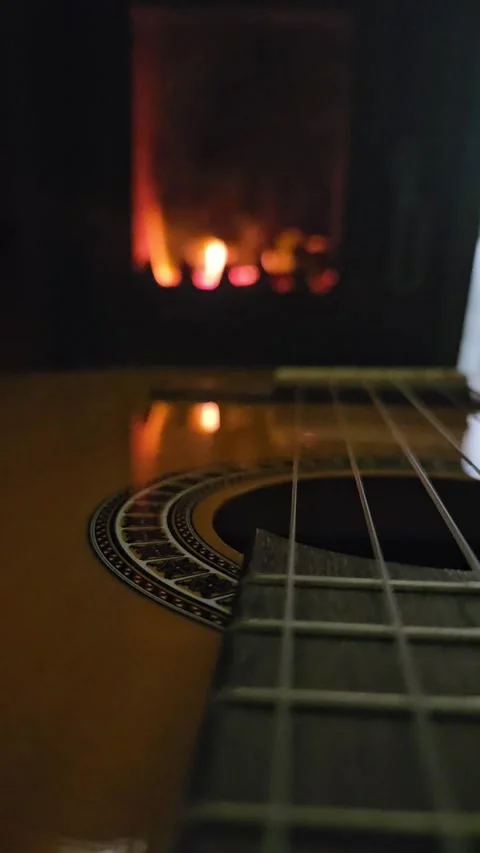 Guitar and fire reflection Stock Footage 297222949