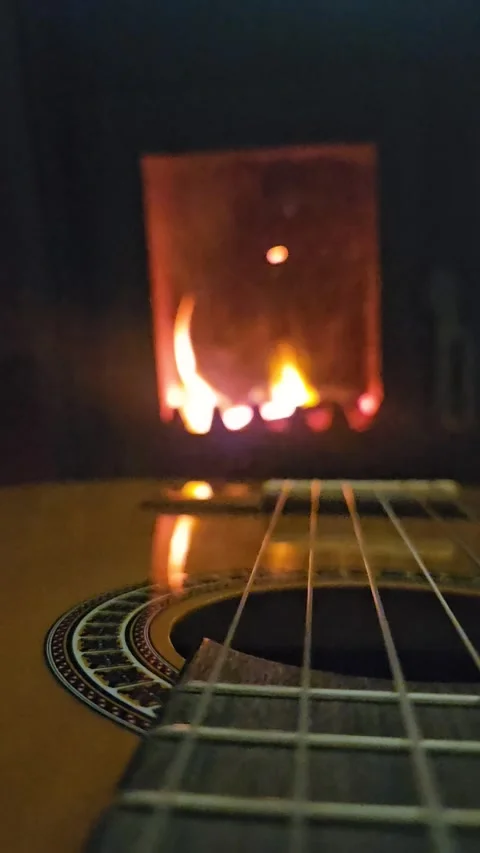 Guitar on a background of fire Stock Footage 297222915