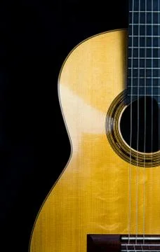 Guitar with a black background with copyspace Foto stock