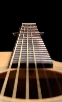 Guitar on a black background Stock Photos