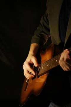Guitar at black background 스톡 사진