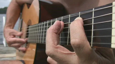 Guitar blues by the lake. Stock Footage