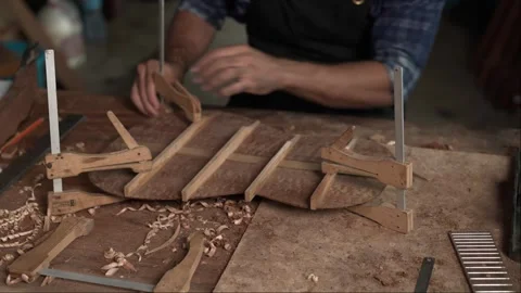 Guitar Bracing Inspection by Luthier Stock Footage 251803565