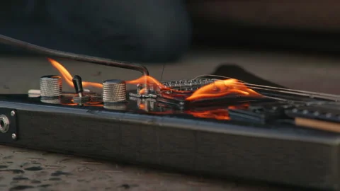 The guitar burns with a flame Stock Footage 162611660