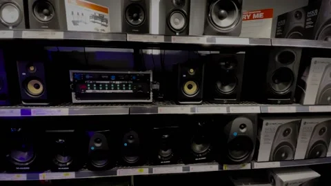 Guitar Center retail store interior pan of studio reference monitors. Stock Footage 170341597