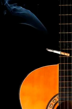 Guitar with Cigarette Stock Photos