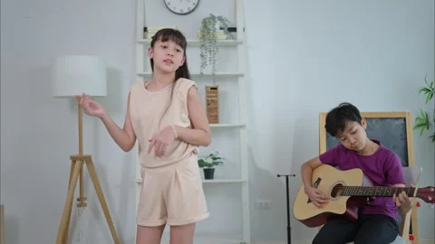 Guitar Class, Teacher and students in music classroom Video stock 309920922