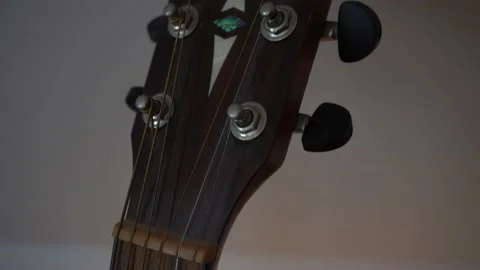 Guitar with dust close up shot Stock Footage 203799219