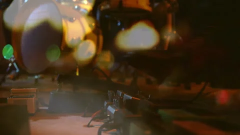 Guitar effect pedals being animated on wooden stage floor, featuring leather Vídeos de archivo 309091121