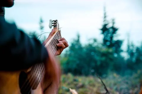 Guitar by the fire Stock Photos