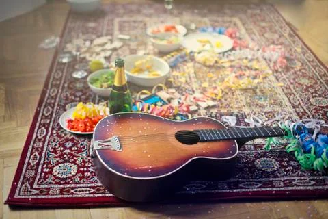 Guitar on the floor Stock Photos