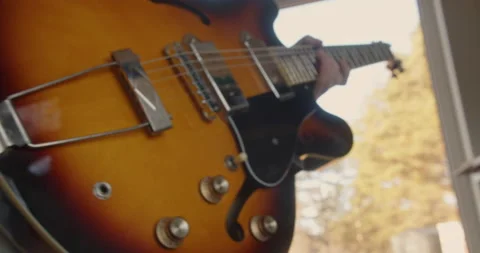 Guitar gets plugged in Stock Footage 170380083
