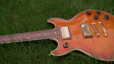 The guitar on the grass Video stock 107997222