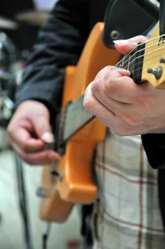 Guitar in hand Stock Photos