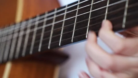 Guitar lesson on basic chords for beginners 스톡 동영상 332467358