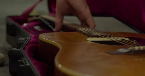 Guitar Lifted Out of Case Stock Footage 201130022