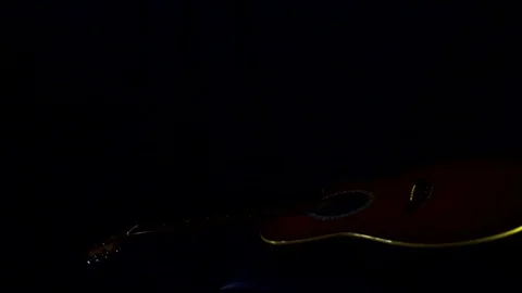 Guitar in low light Stock Footage 78982650