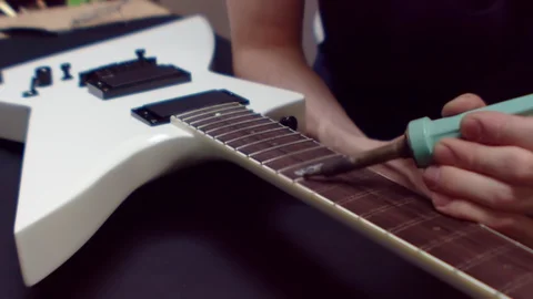 Guitar maker fix a guitar Stock Footage 105262862