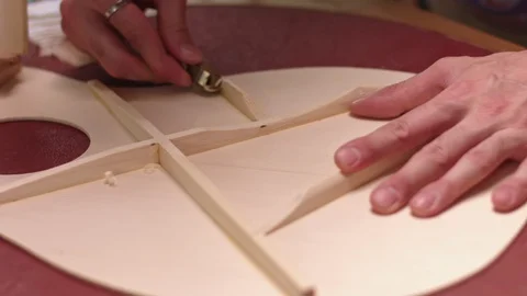 Guitar maker makes guitar braces Video stock 113887187