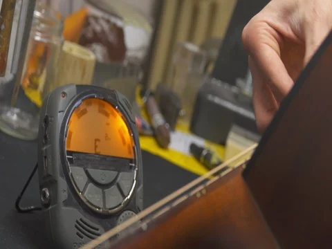 Guitar Maker Tuning Guitar Strings Video stock 72613417