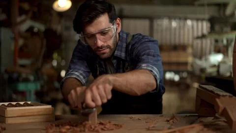 Guitar Making Process: Luthier Uses Planer on Neck Stock Footage 251803378