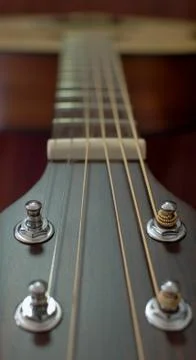 Guitar neck and strings soft focus Stock Photos