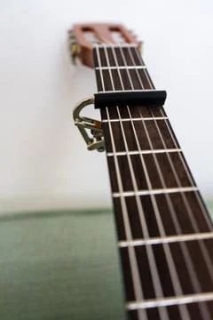 Guitar neck with capo low angle view close up Stock Photos