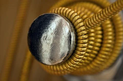 Guitar peg with coiled string macro photography Foto stock