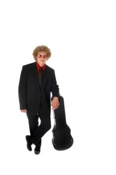 Guitar player leaning on case. Stock Photos