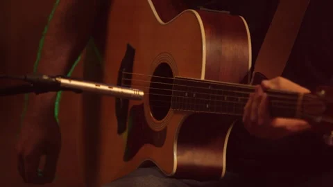 Guitar player performing in studio Stock Footage 136336087