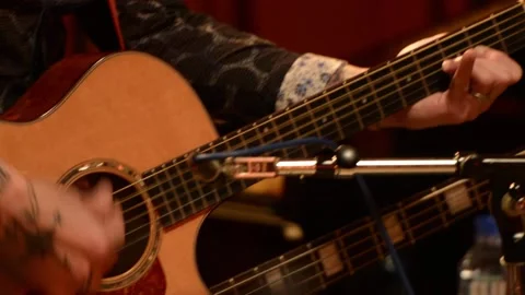 Guitar player performing in studio Stock Footage 136342158