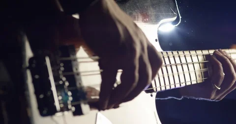 Guitar player playing guitar Stock Footage 114833714