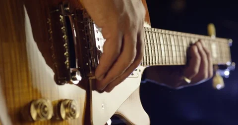 Guitar player playing guitar Stock Footage 114833749